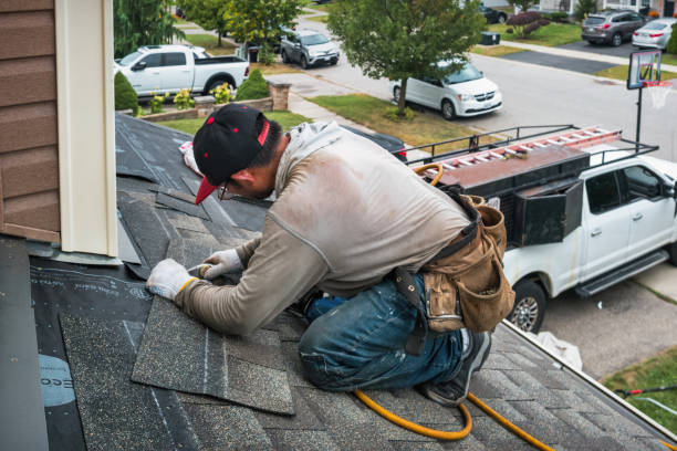 Professional Metal Roofing technician working in Jamesport, NY